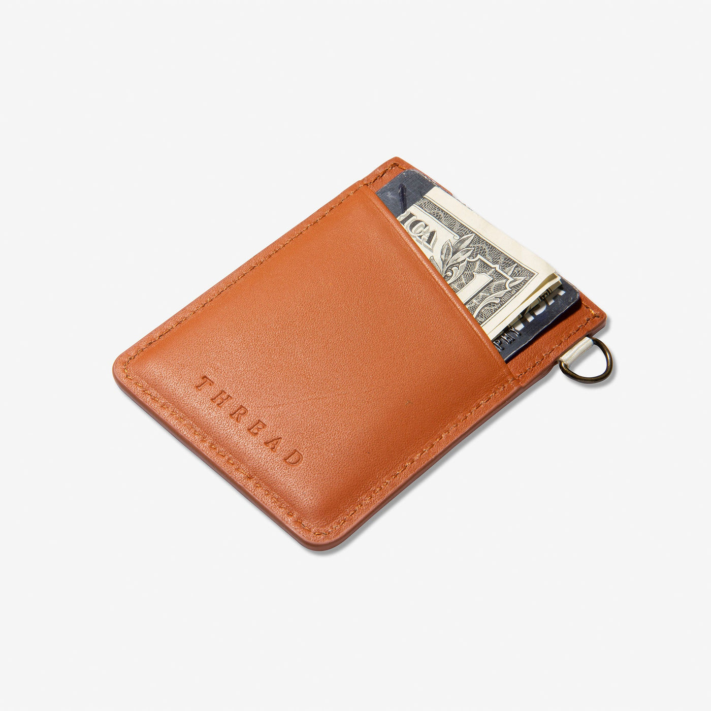 Brown leather vertical wallet with jewel-tone striped elastic