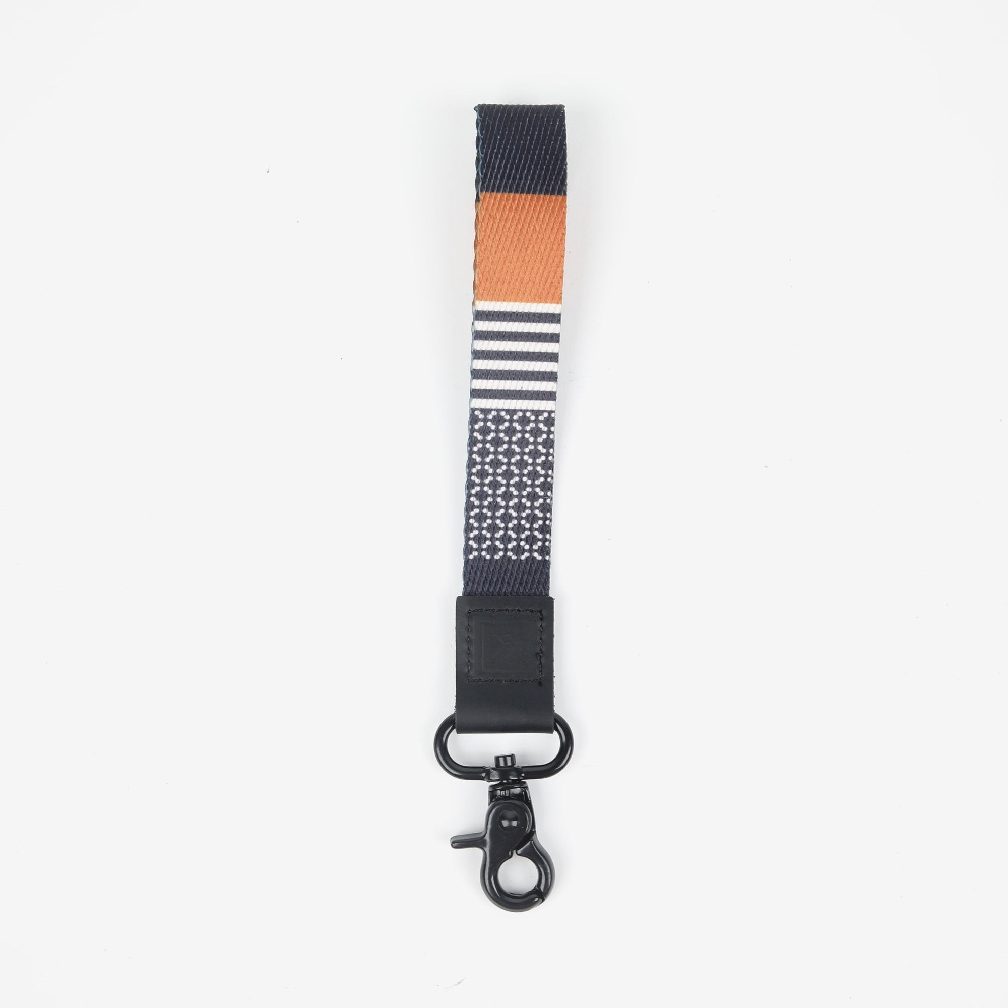 Black, white, and brown striped wrist lanyard