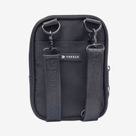 Inside of the Thread® Black crossbody bag showing pockets and printed lining
