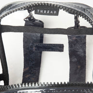 Inside of the Thread® clear crossbody bag showing pockets through the clear TPU