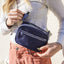 Navy fanny pack with navy piping and white strap
