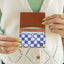 Blue and white checkered bifold wallet