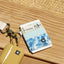 Blue and tan striped elastic wallet