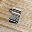 Black, brown, and cream striped elastic wallet