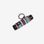 Brown, green, and blue striped lip balm holder