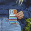 Brown, green, and blue striped phone case wallet