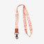 Orange and cream floral neck lanyard