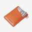 Brown leather card holder with orange and cream floral elastic