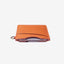 Brown leather card holder with orange and cream floral elastic