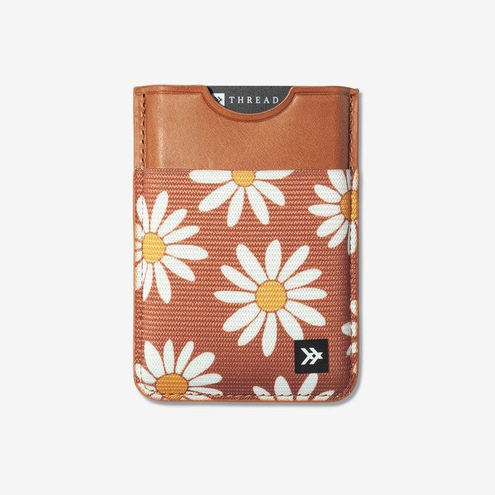 Brown and white floral magnetic wallet with brown leather
