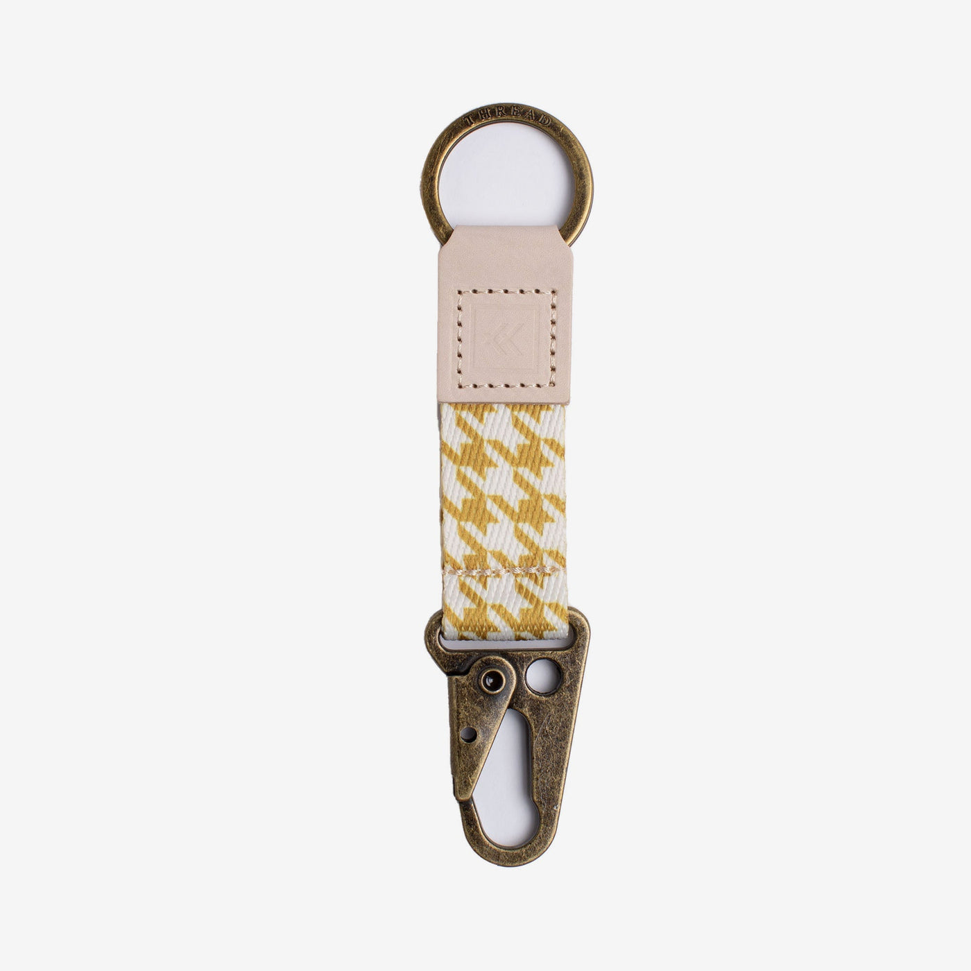 Gold and white houndstooth keychain clip