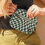 Green and white checkered fanny pack