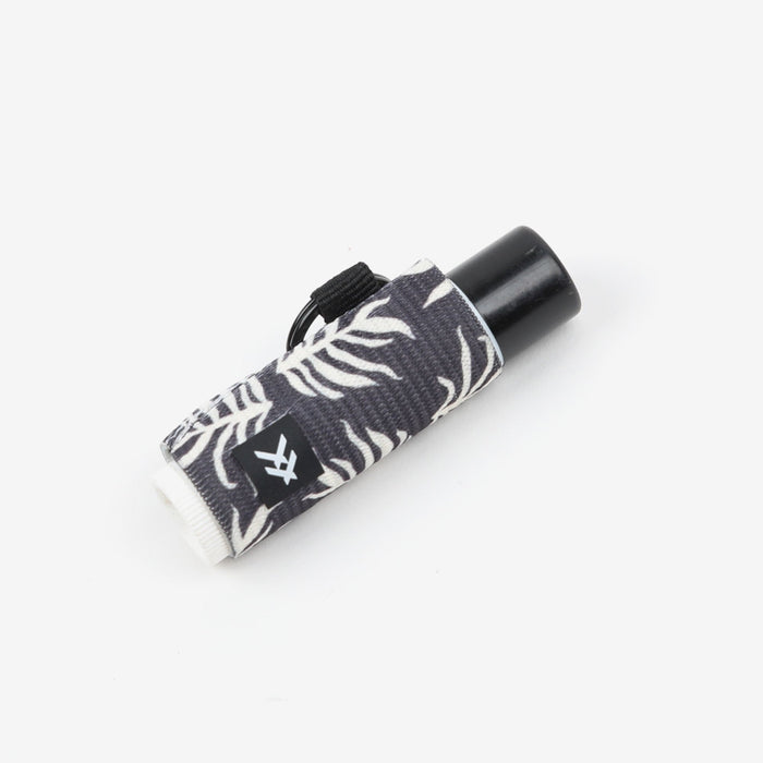 Black and white leaf botanical lip balm holder