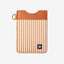 Brown leather card holder with orange and cream striped elastic