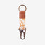 Orange and cream leopard print keychain clip with brown leather