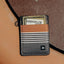 Black, white, and brown striped vertical wallet