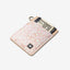 Cream leather vertical wallet with pink and white floral elastic