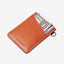 Brown leather card holder with multi-color floral elastic